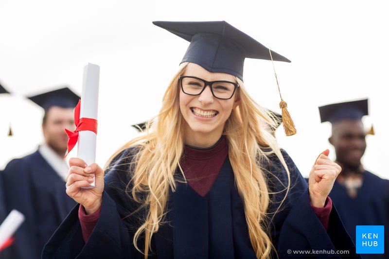 Happy student holds a graduation certificate